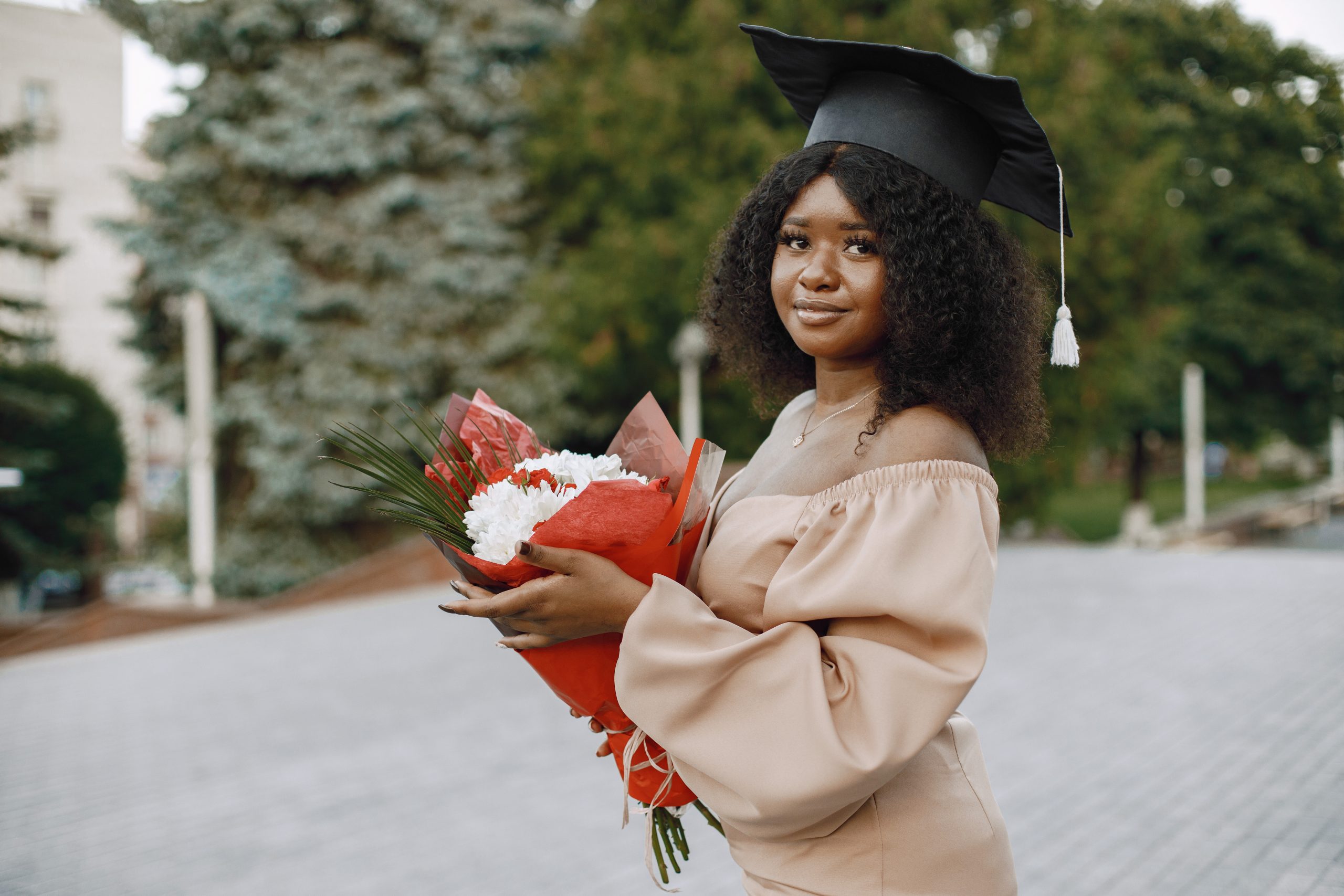 Excited african american woman at her graduation.